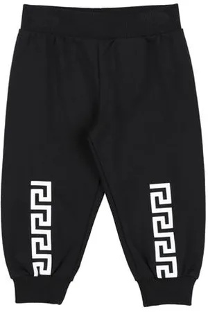 VERSACE PARTES DE ABAJO - Pantalones