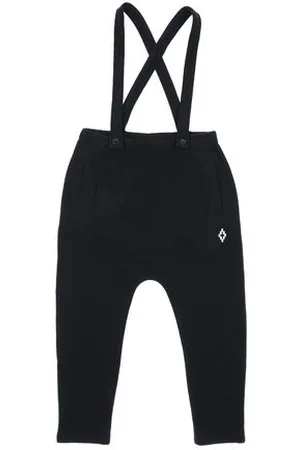 MARCELO BURLON PARTES DE ABAJO - Pantalones