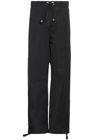 VERSACE PARTES DE ABAJO - Pantalones
