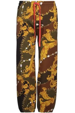 VERSACE PARTES DE ABAJO - Pantalones