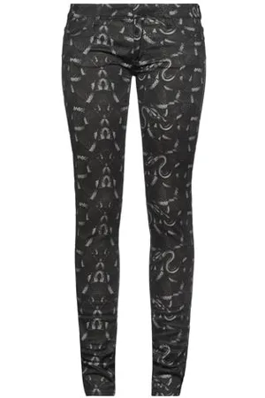 MARCELO BURLON PARTES DE ABAJO - Pantalones