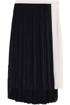 SEMICOUTURE PARTES DE ABAJO - Faldas midi