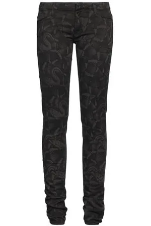 MARCELO BURLON PARTES DE ABAJO - Pantalones vaqueros