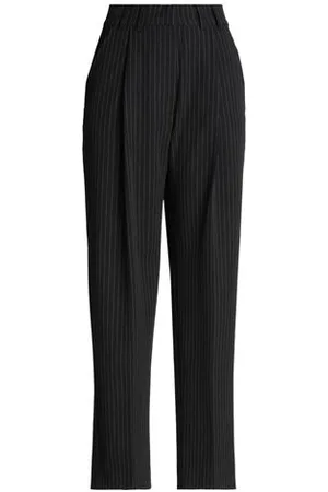 EDITED the label PARTES DE ABAJO - Pantalones