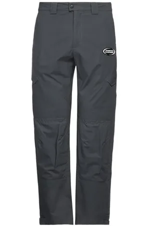 MARCELO BURLON PARTES DE ABAJO - Pantalones