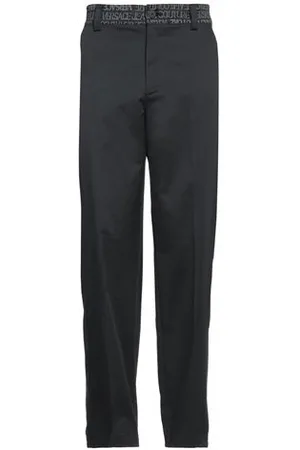 VERSACE PARTES DE ABAJO - Pantalones