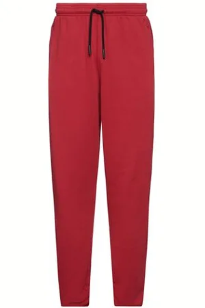 MARCELO BURLON PARTES DE ABAJO - Pantalones