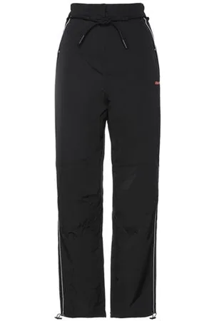 MARCELO BURLON PARTES DE ABAJO - Pantalones