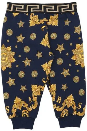 VERSACE PARTES DE ABAJO - Pantalones