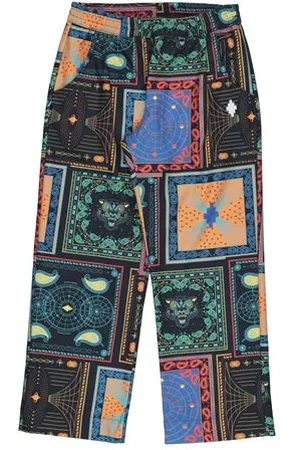 MARCELO BURLON PARTES DE ABAJO - Pantalones