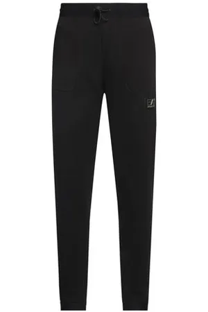 EA7 PARTES DE ABAJO - Pantalones