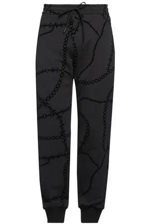 VERSACE PARTES DE ABAJO - Pantalones