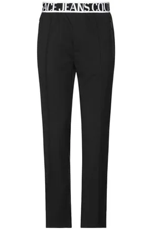 VERSACE PARTES DE ABAJO - Pantalones