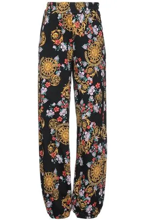 VERSACE PARTES DE ABAJO - Pantalones