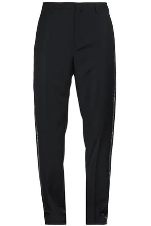 VALENTINO GARAVANI PARTES DE ABAJO - Pantalones