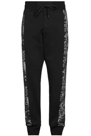 VERSACE PARTES DE ABAJO - Pantalones