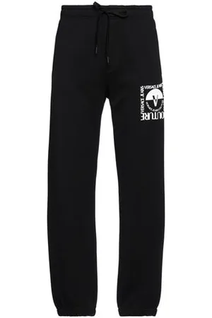 VERSACE PARTES DE ABAJO - Pantalones