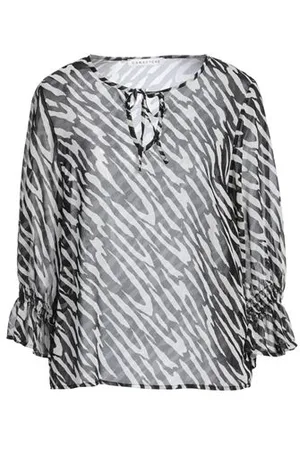 Caractere CAMISETAS Y TOPS - Tops