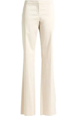 VERSACE PARTES DE ABAJO - Pantalones