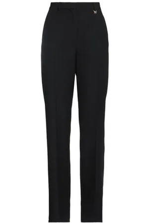 VERSACE PARTES DE ABAJO - Pantalones
