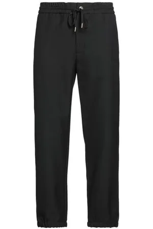 VERSACE PARTES DE ABAJO - Pantalones
