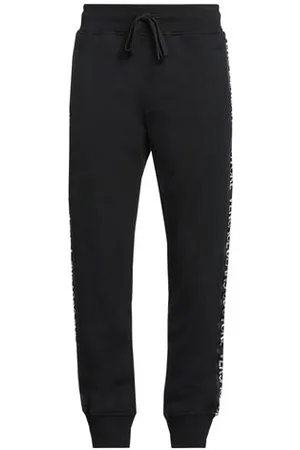 VERSACE PARTES DE ABAJO - Pantalones