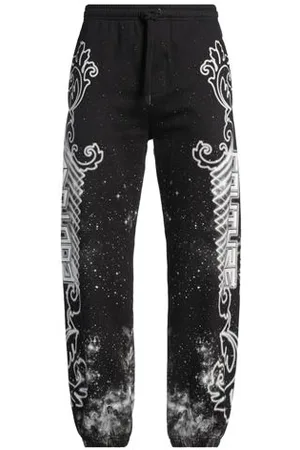 VERSACE PARTES DE ABAJO - Pantalones