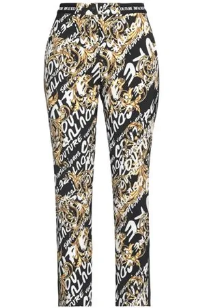 VERSACE PARTES DE ABAJO - Pantalones