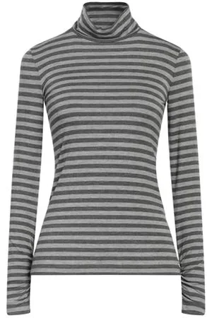 Caractere CAMISETAS Y TOPS - Camisetas