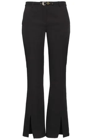 VERSACE PARTES DE ABAJO - Pantalones