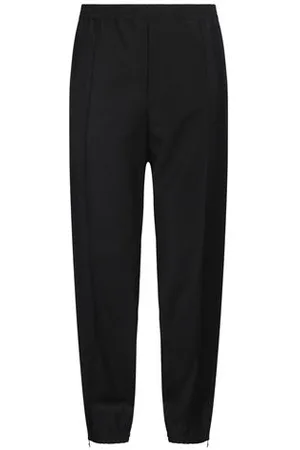 VERSACE PARTES DE ABAJO - Pantalones