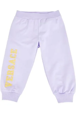 VERSACE PARTES DE ABAJO - Pantalones