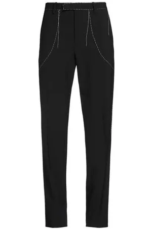 OFF-WHITE PARTES DE ABAJO - Pantalones