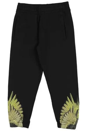 MARCELO BURLON PARTES DE ABAJO - Pantalones