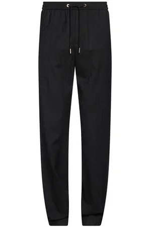 VERSACE PARTES DE ABAJO - Pantalones