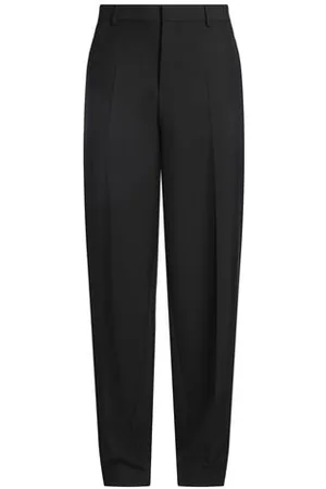 VERSACE PARTES DE ABAJO - Pantalones