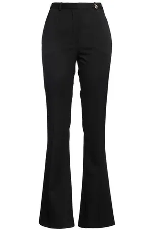 VERSACE PARTES DE ABAJO - Pantalones