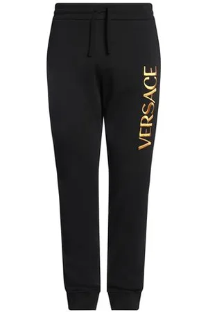 VERSACE PARTES DE ABAJO - Pantalones