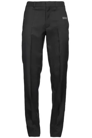 OFF-WHITE PARTES DE ABAJO - Pantalones