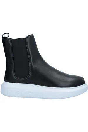 Moschino CALZADO - Botines de caña alta