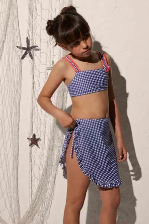YSABEL MORA Falda pareo playa niña estampado a rayas con volantes