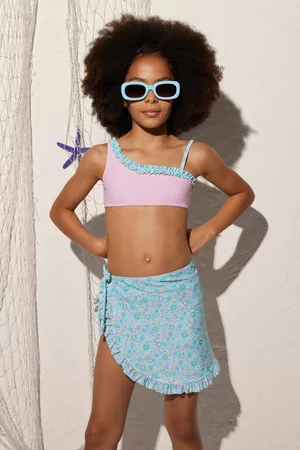 YSABEL MORA Falda pareo playa niña estampado floral con volantes y lazo