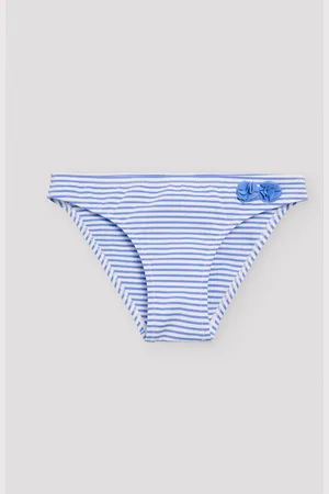 YSABEL MORA Culetín niña estampado rayas azules con textura detalle flores