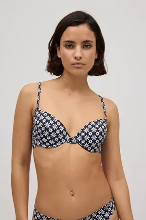 YSABEL MORA Top bikini aro clásico flores blanco y negro copa B