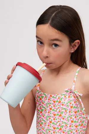 YSABEL MORA Bañador niña espalda cruzada estampado corazones