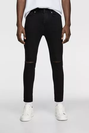 Rotos Pantalones y vaqueros para Hombre en color negro | FASHIOLA.es